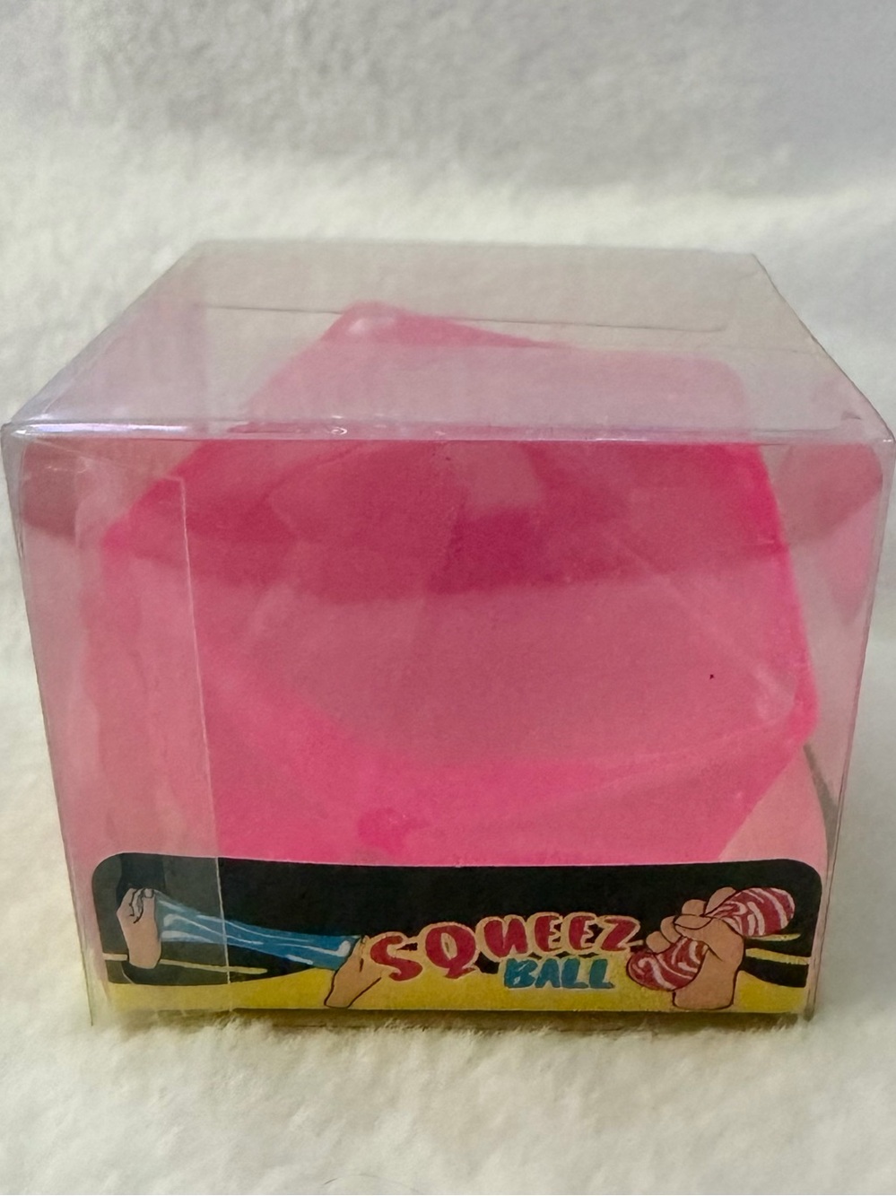 Pink Squeeze Ball in Clear Box.  Packs in original clear display box